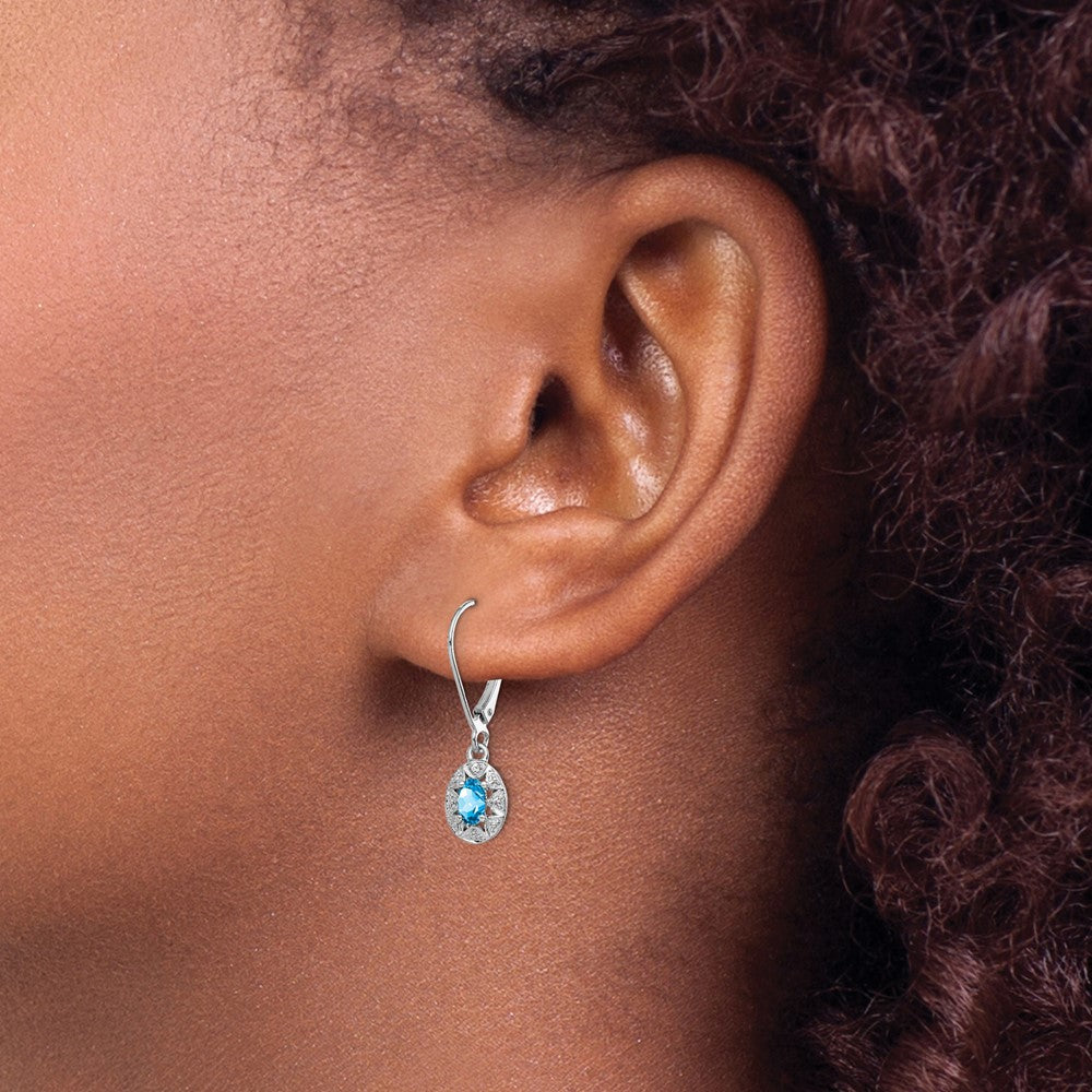 Sterling Silver Rhodium-plated Diam. & Blue Topaz Earrings