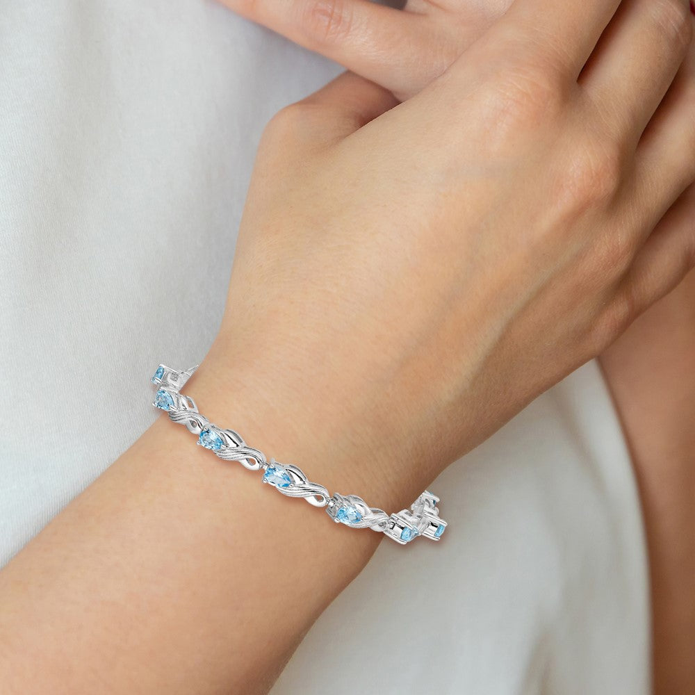 Sterling Silver Rhodium-plated Blue Topaz Bracelet